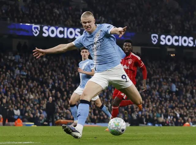 Manchester City's Erling Haaland shoots at goal