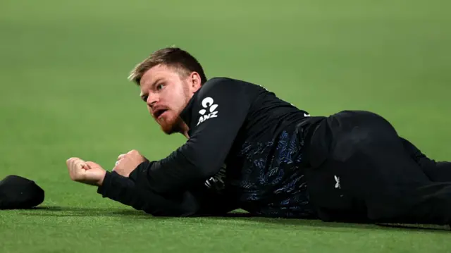 Glenn Phillips of New Zealand reacts after dropping a catch