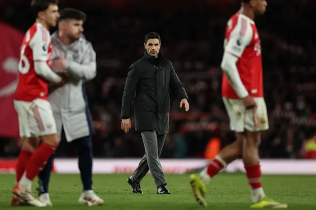Arsenal's Spanish manager Mikel Arteta (C) leaves following his team's victory in the English Premier League football match between Arsenal and Chelsea at the Emirates Stadium in London on March 1, 2026.