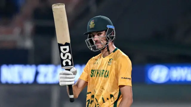 South Africa's Marco Jansen celebrates after scoring a half-century