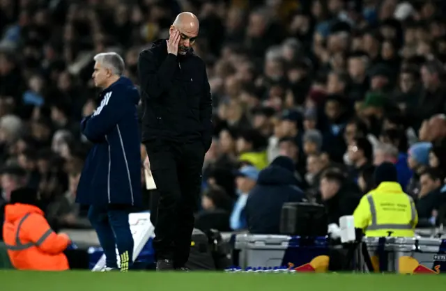 Manchester City's Spanish manager Pep Guardiola reacts