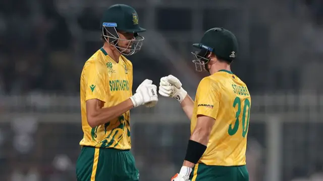 Tristan Stubbs and Marco Jansen of South Africa bump fists as they bat together
