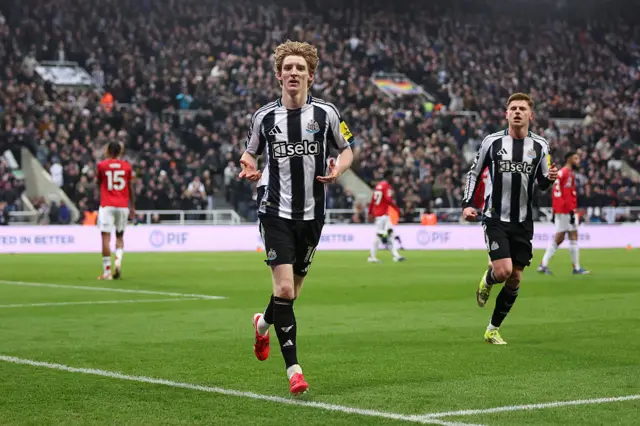 Anthony Gordon of Newcastle United celebrates scoring his team's first goal from the penalty spot