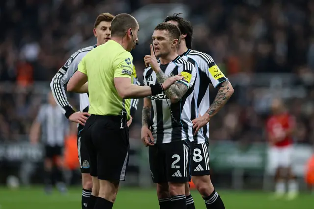 Kieran Trippier of Newcastle United (2) talks with Referee Peter Bankes