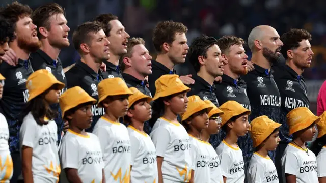 New Zealand players line up during the National Anthems