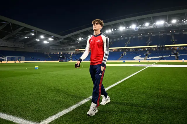 Max Dowman of Arsenal inspects the pitch prior to the Premier League match between Brighton & Hove Albion and Arsenal at Amex Stadium on March 04, 2026 in Brighton, England.