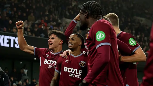 Crysencio Summerville of West Ham United celebrates scoring his team's first goal with teammates