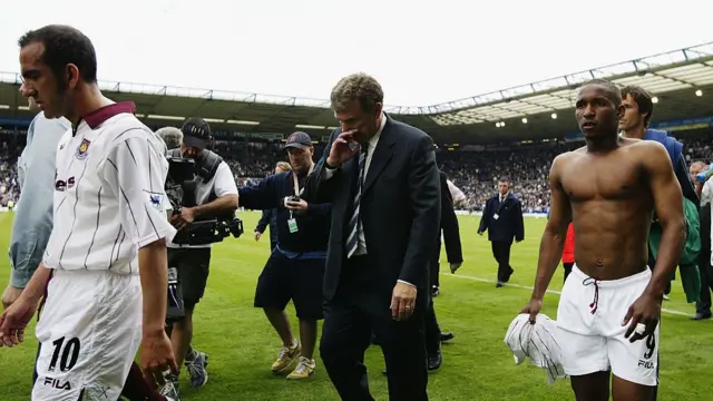 Paulo Di Canio, Trevor Brooking and Jermaine Defoe after West Ham were relegated in 2003
