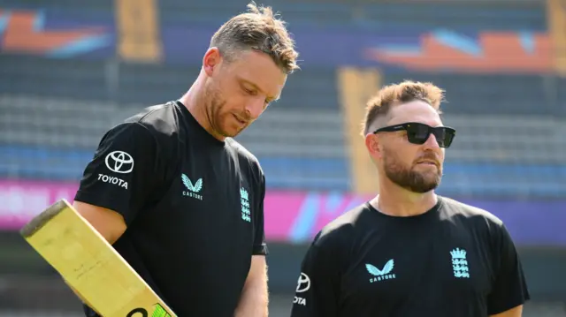 Jos Buttler with Brendon McCullum