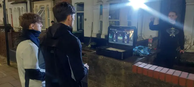 Helim playing video games