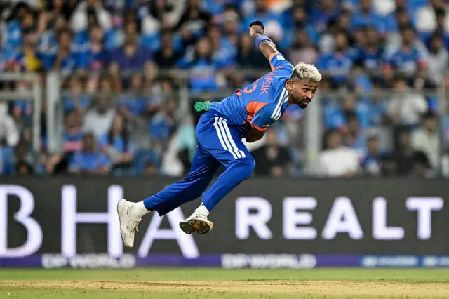 India's Hardik Pandya delivers a ball during the 2026 ICC Men's T20 Cricket World Cup semi-final match between India and England at the Wankhede Stadium in Mumbai on March 5, 2026