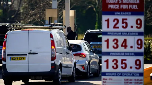 People dispensing fuel at a petrol station Essex on Thursday