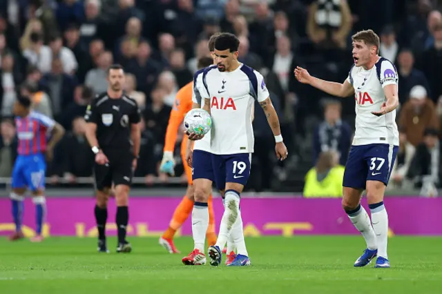Dominic Solanke and Micky van de Ven of Tottenham Hotspur look dejected after Ismaila Sarr