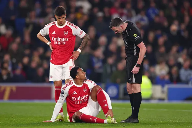 Gabriel sits down with an injury against Brighton