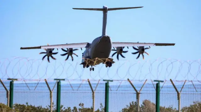 A British Airbus A400M military aircraft approaches RAF Akrotiri on Cyprus earlier today