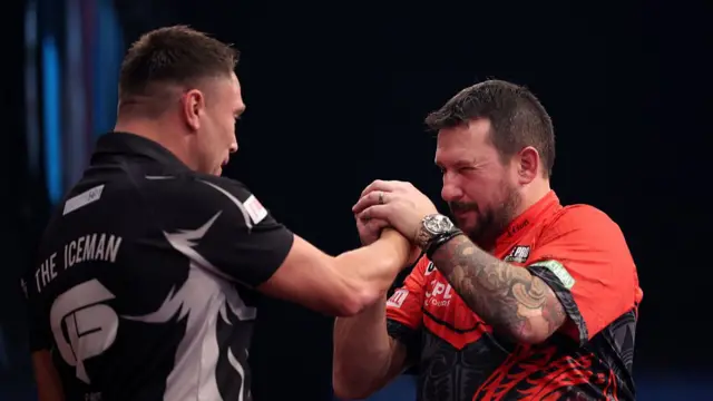 Gerwyn Price and Jonny Clayton interact