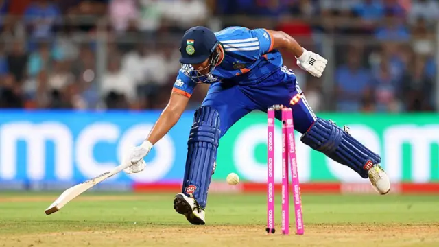Shivam Dube of India is run out by Harry Brook