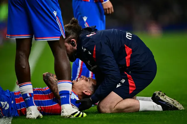 Daniel Munoz gets treatment from a physio