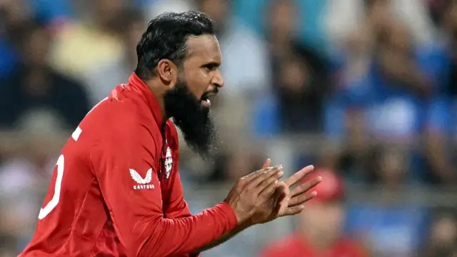England's Adil Rashid gestures