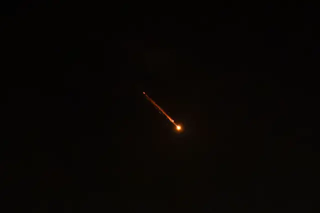 Rocket trails are seen in the sky above Tel Aviv amid a fresh barrage of Iranian missile attacks