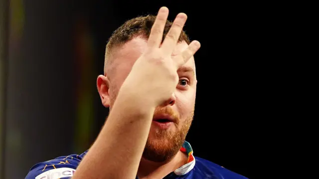 Josh Rock signals he has won three legs