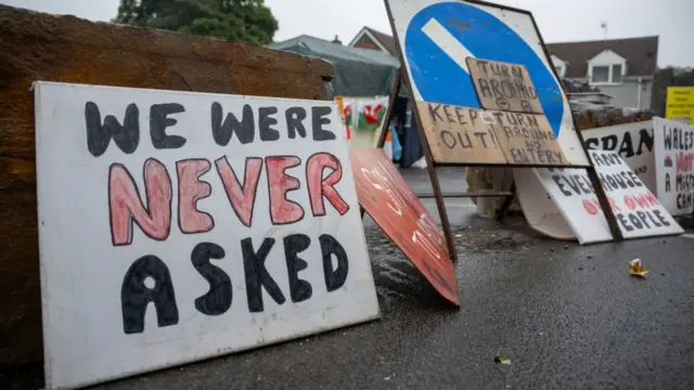 Protest signs out Stradey Park Hotel