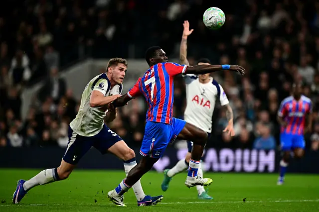 Ismaila Sarr is fouled by Tottenham Hotspur's Dutch defender #37 Micky van de Ven