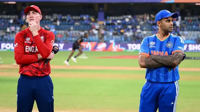 : Suryakumar Yadav of India alongside England captain Harry Brook ahead of the ICC Men's T20 World Cup India & Sri Lanka 2026 Semi-Final