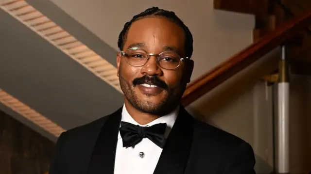 Ryan Coogler wearing a tuxedo at the Baftas last month