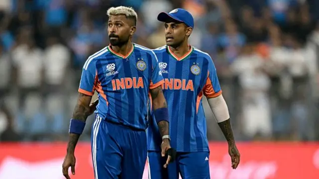 India's Hardik Pandya (L) and captain Suryakumar Yadav