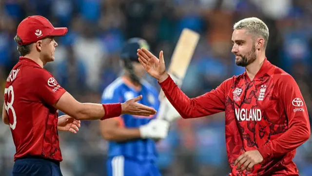 England's Will Jacks (R) celebrates with teammate Sam Curran
