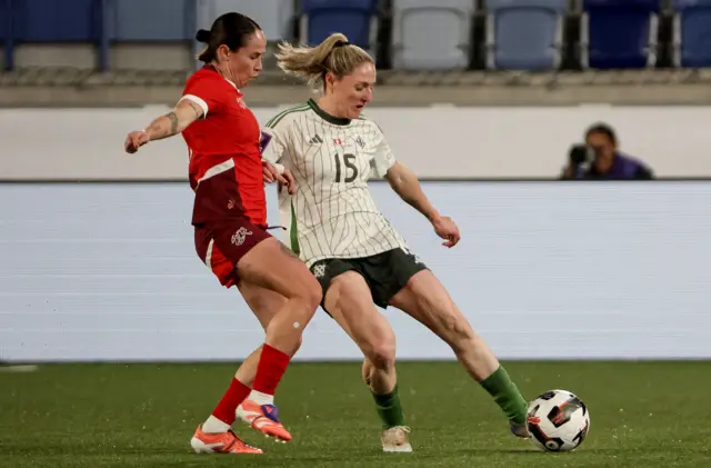 Rebecca Holloway battling for the ball