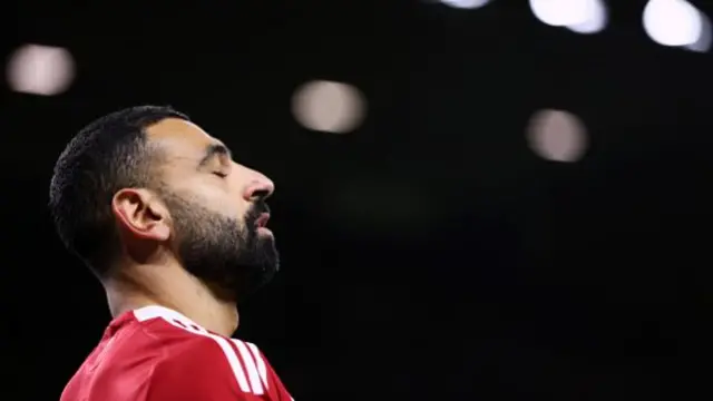 Mohamed Salah of Liverpool reacts