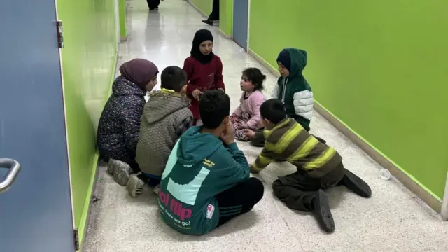Children sheltering in a school, transformed into a makeshift shelter in Beirut