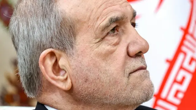 A close-up file photo of Iranian President Masoud Pezeshkian