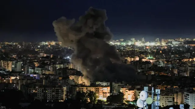 Smoke billows after reported strikes on Beirut's southern suburbs