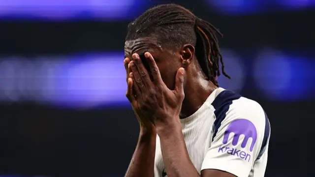 Yves Bissouma reacts with his hands over his face