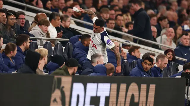 Pedro Porro throwing a bottle