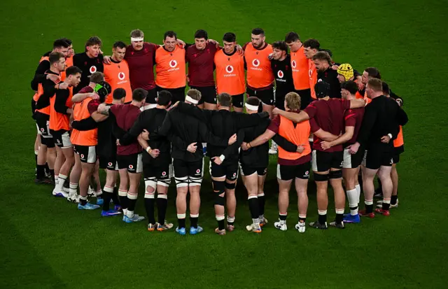 The Wlesh team in a huddle