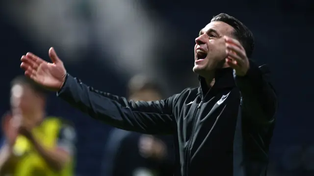 Matt Bloomfield celebrates winning