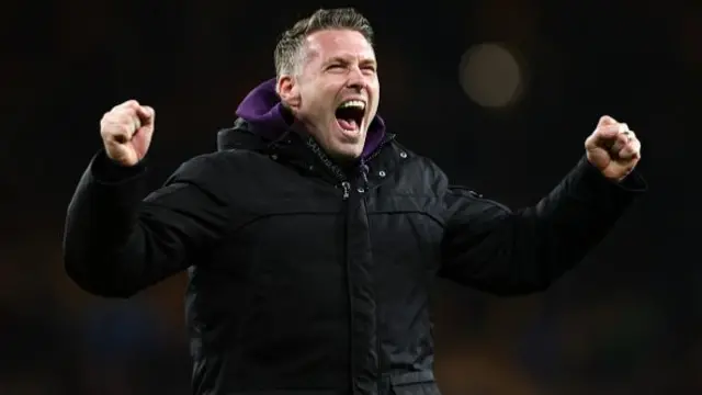 Rob Edwards, Manager of Wolverhampton Wanderers, celebrates victory