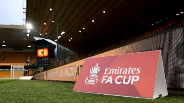 A general view of a Emirates FA Cup toblerone advert next to the pitch