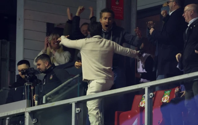 Wrexham co-owners Rob McElhenney and Ryan Reynolds celebrate their first goal