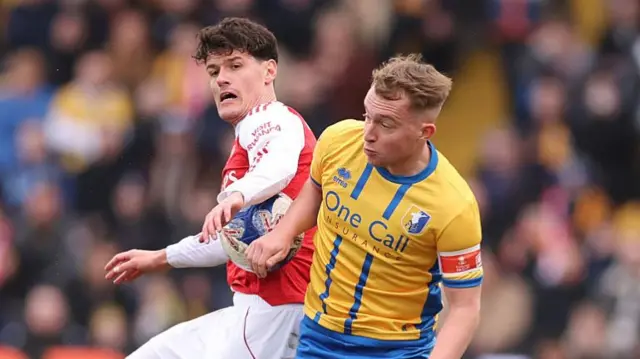 Mansfield Arsenal action