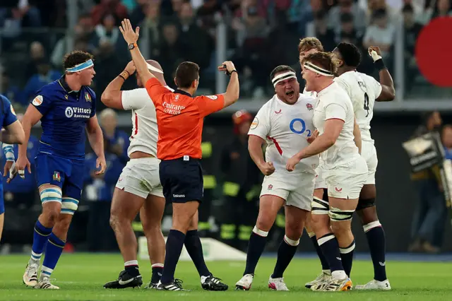 England players celebrating a penalty