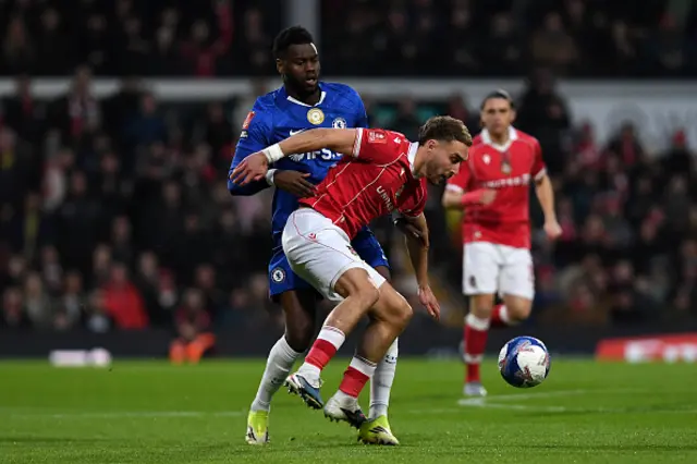 Sam Smith is put under pressure by Chelsea's French defender #05 Benoit Badiashile