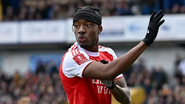 Madueke reacting