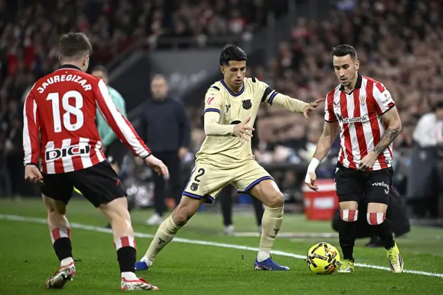 Barcelona's Portuguese defender #02 Joao Cancelo fights for the ball with Athletic Bilbao's Spanish forward #07 Alex Berenguer