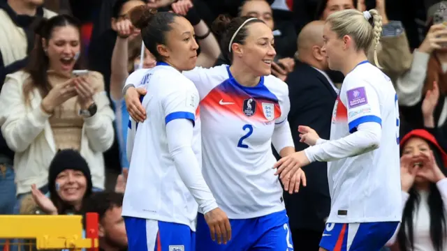 Lucy Bronze celebrates
