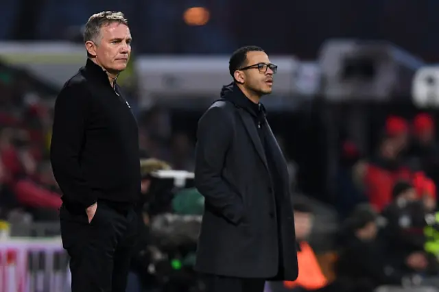 Phil Parkinson and Liam Rosenior look on